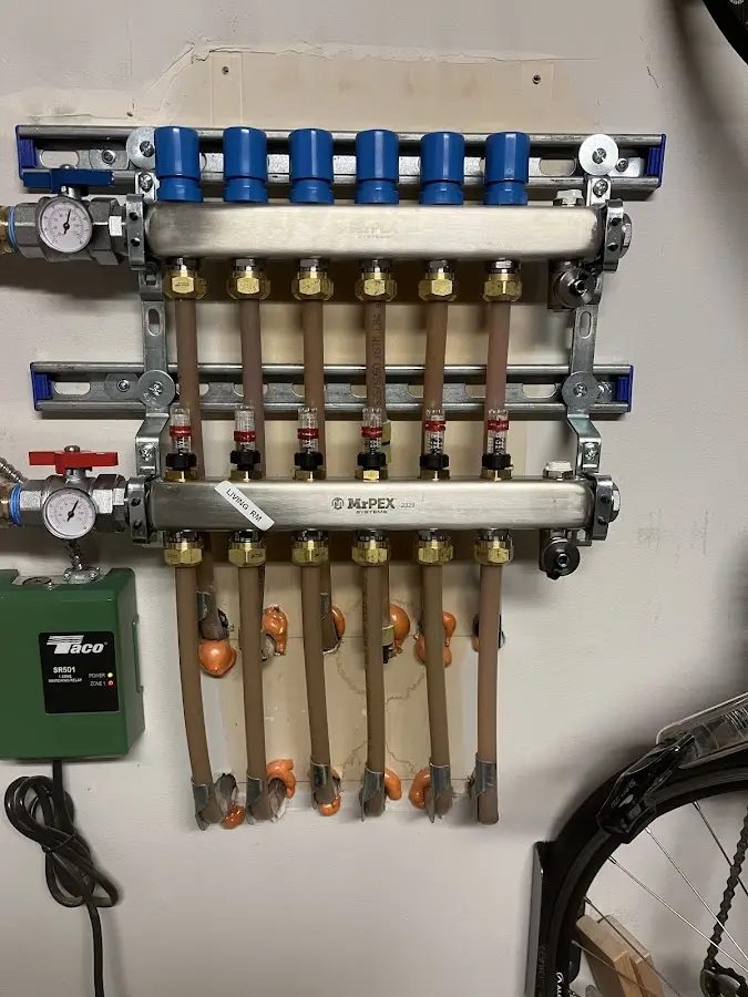 Plumber performing Leak Detection at a residential property in Monfort Heights